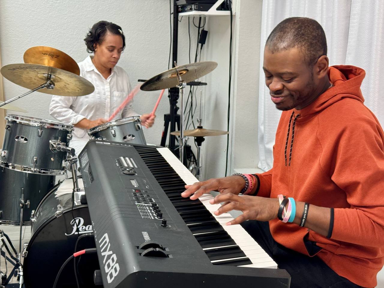 Brother Anthony playing keyboard